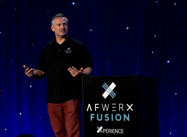 Mark Rowland, director of AFWERX Vegas, speaks to a crowd of attendees at the AFWERX Fusion Experience event in Las Vegas, June 20, 2018. AFWERX Vegas provides a hub for innovators dedicated to making creative fixes for the Air Force’s toughest challenges. (U.S. Air Force photo by Airman Bailee A. Darbasie)