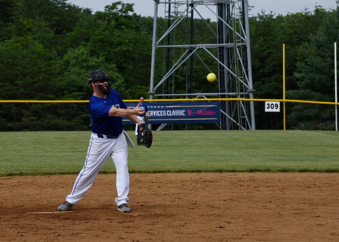 Master Sgt. Matt Campbell, National Capital Region Air Force softball team pitcher, pitches during the preliminary round of the Armed Services Classic softball tournament at Jericho Park in Bowie, Md., June 23, 2018. The Air Force team will compete in the championship game scheduled for July 13 at Nationals Park in Washington, D.C. (U.S. Air Force photo by Senior Airman Abby L. Richardson)