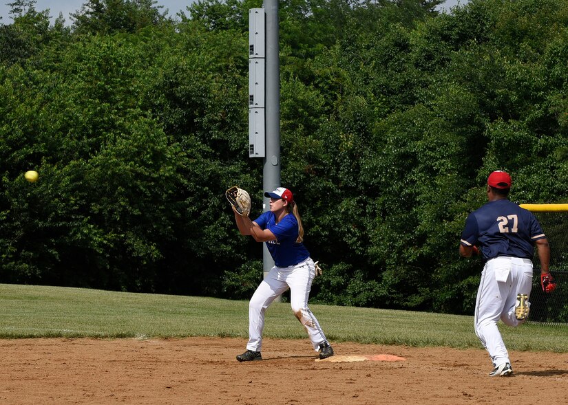 Staff Sgt. Bobbi Robinson, National Capital Region Air Force softball team first baseman, prepares to catch the ball at first base during the preliminary round of the Armed Services Classic softball tournament at Jericho Park in Bowie, Md., June 23, 2018. The Air Force will go on to compete in the championship game at Nationals Park in Washington, D.C. (U.S. Air Force photo by Senior Airman Abby L. Richardson)