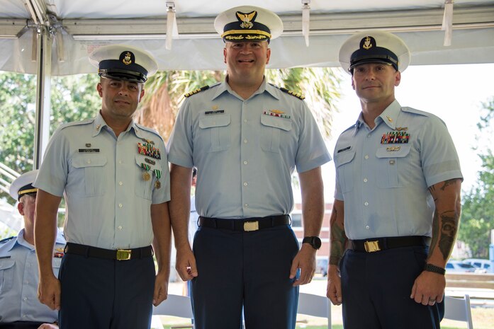 Senior Chief Petty Officer Brian Martin assumes command of Coast Guard Station Charleston from Senior Chief Petty Officer Justin Longval during a change of command ceremony, June 22, 2018, in Charleston, S.C. Capt. John Reed, the commanding officer of Coast Guard Sector Charleston, presided over the ceremony.