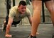 U.S. Air Force Airman Basic Cole Kramn, a Survival, Evasion, Resistance and Escape Specialist Training Orientation Course candidate, completes a push-up during a mock physical fitness assessment at the SERE specialist schoolhouse at Joint Base San Antonio-Lackland, Texas, March 22, 2018. About 60 percent of the SERE specialist candidates do not successfully complete the course, with the majority of candidates self-eliminating from the program.  (U.S. Air Force photo by Staff Sgt. Chip Pons)