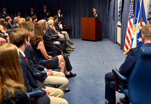 Air Force Chief of Staff Gen. David L. Goldfein talks about the actions taken by Lt. Col Daniel Finnegan during the Kolligian Trophy presentation in the Pentagon, Arlington, Va., June 25, 2018. (U.S. Air Force photo by Wayne A. Clark)