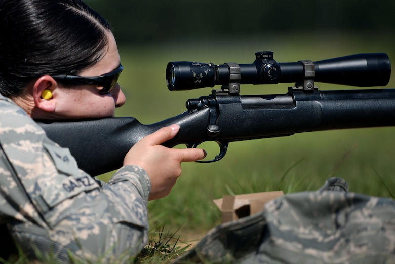 Senior Airman Jennifer Gamez, 19th Security Forces Squadron installation entry controller, prepares to fire an M24 sniper weapon system at a range on Camp Robinson, Ark., June 6, 2018. Gamez was the first female in approximately five years to complete advanced designated marksman training. (U.S. Air Force photo by Airman 1st Class Kristine M. Gruwell)
