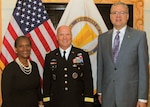 Lt. Gen. Kenneth Dahl (center), commanding general, U.S. Army Installation Management Command, welcomes IMCOM's two new Senior Executive Service leaders within its headquarters staff at Joint Base San Antonio-Fort Sam Houston. At left is Delia Adams, who, as IMCOM’s senior contracting executive, is responsible for an annual $4.5 billion portfolio of appropriated and non-appropriated contracts and procurements. At right is J. Randall Robinson, who will serve as the executive deputy to the commanding general.