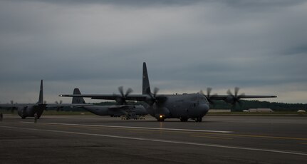 U.S. Air Force C-130J Super Hercules aircraft from Yokota Air Base, Japan prepare for takeoff during Red Flag-Alaska 18-2 operations at Joint Base Elmendorf-Richardson, Alaska, June 21, 2018. RF-A is Pacific Air Forces’ premier air combat exercise that provides joint offensive counter-air, interdiction, close air support and large force employment training in a simulated combat environment. RF-A executes the world's premier tactical joint and coalition air combat employment exercise, designed to replicate the stresses warfighters face during their first eight to ten combat sorties. RF-A has the assets, range, and support structure to train joint and combined warfighting doctrine against realistic, robust enemy integrated threat systems, under safe and controlled conditions.