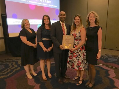 SAN DIEGO - The NSWC Crane T2 team accepts the George Linsteadt Award for Excellence in Technology Transer in San Diego. Pictured (l-r): Annie Bullock, T2 & IP Program Support, Jenna Dix, T2 Agreements Administrator, Dr. Jagadeesh Pamulapati, Office of the Secretary of Defense, Director, Labratories & STEM Development Office, Kelly Stephens, T2 Program Support & Brooke Pyne, ORTA and T2 Program Director.