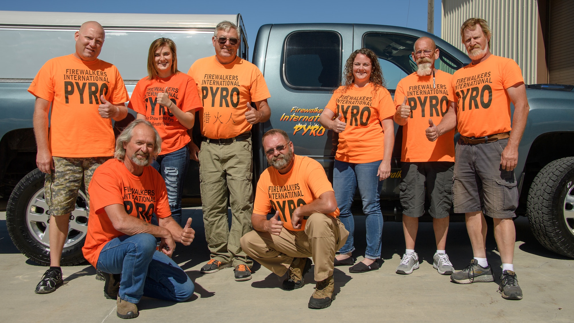 The team from Firewalkers International Pyro pose for a photo June 20, 2018, at Hill Air Force Base, Utah. The team provided the pyrotechnics during the 388th Fighter Wing's F-35A attack demonstration during the Warriors Over the Wasatch Air and Space Show June 23-24. (U.S. Air Force photo by R. Nial Bradshaw)