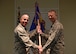 U.S. Air Force Col. David Vaclavik, 20th Mission Support Group commander, left, gives the 20th Security Forces Squadron (SFS) guidon to Maj. Scott Haselden, 20th SFS commander, during a change of command ceremony at Shaw Air Force Base, S.C., June 26, 2018