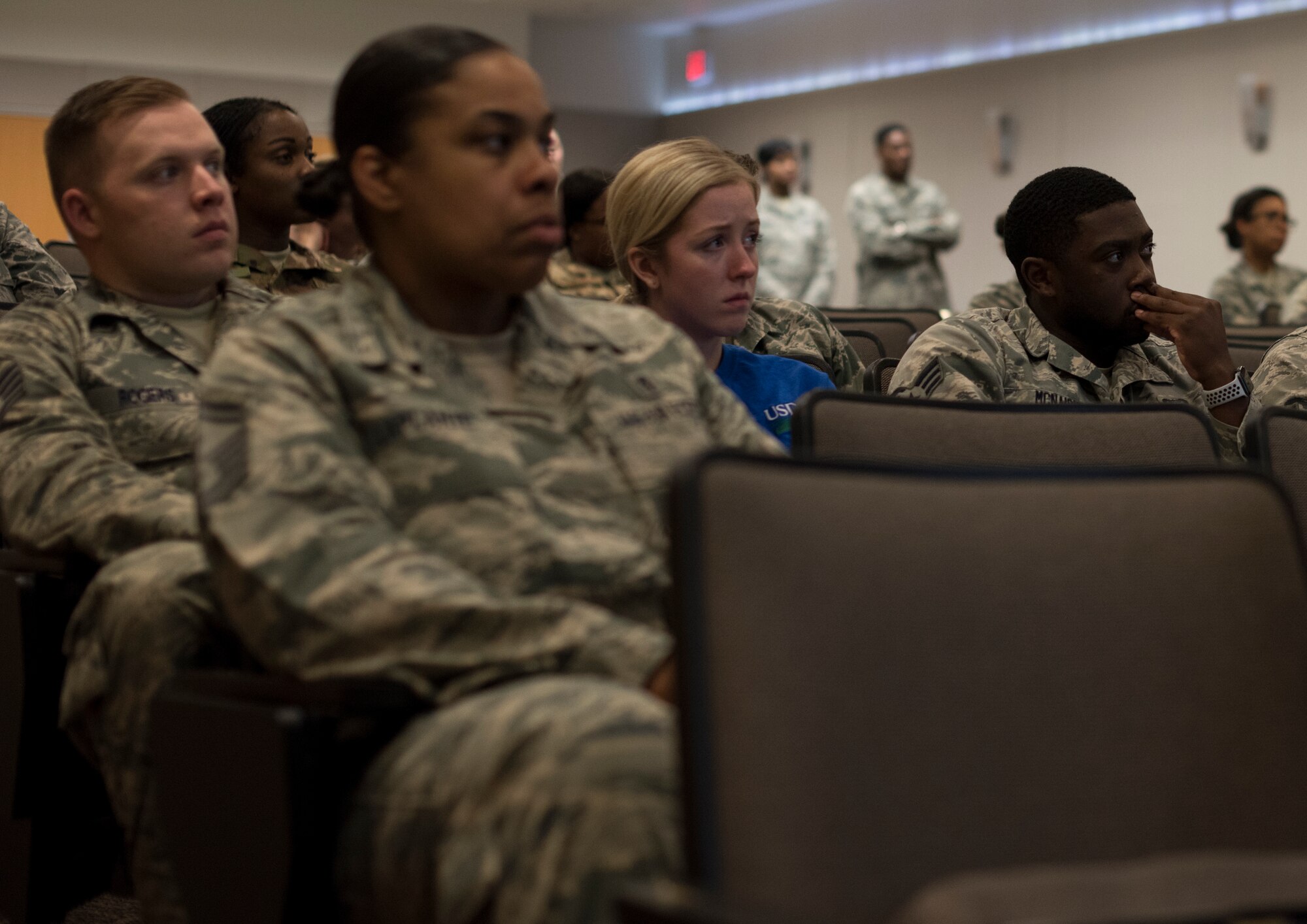 Audience members listen to a speech during the Storytellers convention on Joint Base McGuire-Dix-Lakehurst, N.J., June 20, 2018. The event allows members of the Joint Base MDL community to hear and share life experiences from other community members. U.S. Air Force Staff Sgt. Nakeisha Maroney, 87th Air Base Wing protocol specialist and 5/6 Council president, said the stories shared can be a wide range of different topics. Anyone who has a story that might benefit even one person is worth sharing. (U.S. Air Force photo by Airman Ariel Owings)