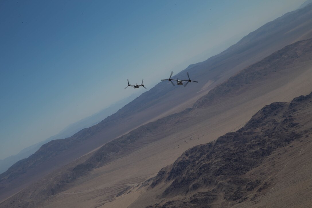 MV-22B Ospreys with Marine Medium Tiltrotor Squadron 764, Marine Aircraft Group 41, 4th Marine Aircraft Wing, conduct aerial assault support during Integrated Training Exercise 4-18, at Marine Corps Air Ground Combat Center Twentynine Palms, Calif., June 23, 2018. VMM-764, known as “moonlight,” is based out of Marine Corps Air Station Miramar and provided air combat element support to Marine Air Ground Task Force 23 during ITX 4-18. (U.S. Marine Corps photo by Lance Cpl. Samantha Schwoch/released)