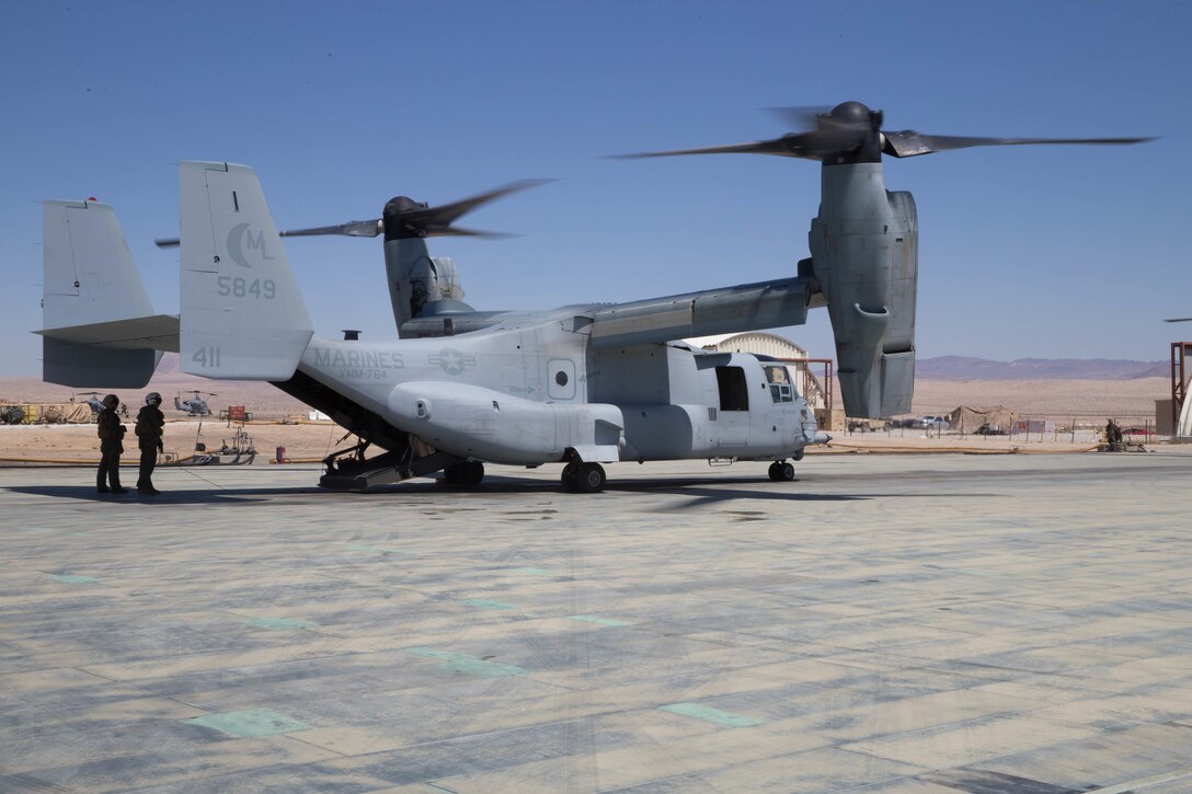An MV-22B Osprey with Marine Medium Tiltrotor Squadron 764, Marine Aircraft Group 41, 4th Marine Aircraft Wing, refuels at the Twentynine Palms Strategic Expeditionary Landing Field, during Integrated Training Exercise 4-18 at Marine Corps Air Ground Combat Center Twentynine Palms, Calif., June 23, 2018. VMM-764, known as “moonlight,” is based out of Marine Corps Air Station Miramar and provided air combat element support to Marine Air Ground Task Force 23 during ITX 4-18. (U.S. Marine Corps photo by Lance Cpl. Samantha Schwoch/released)