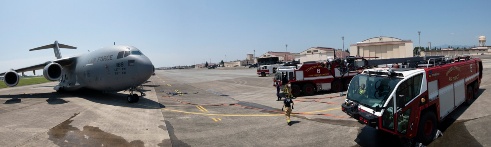 Yokota fire department and 730th Air Mobility Squadron conduct an Emergency Response Exercise at Yokota Air Base, Japan, June 25, 2018.