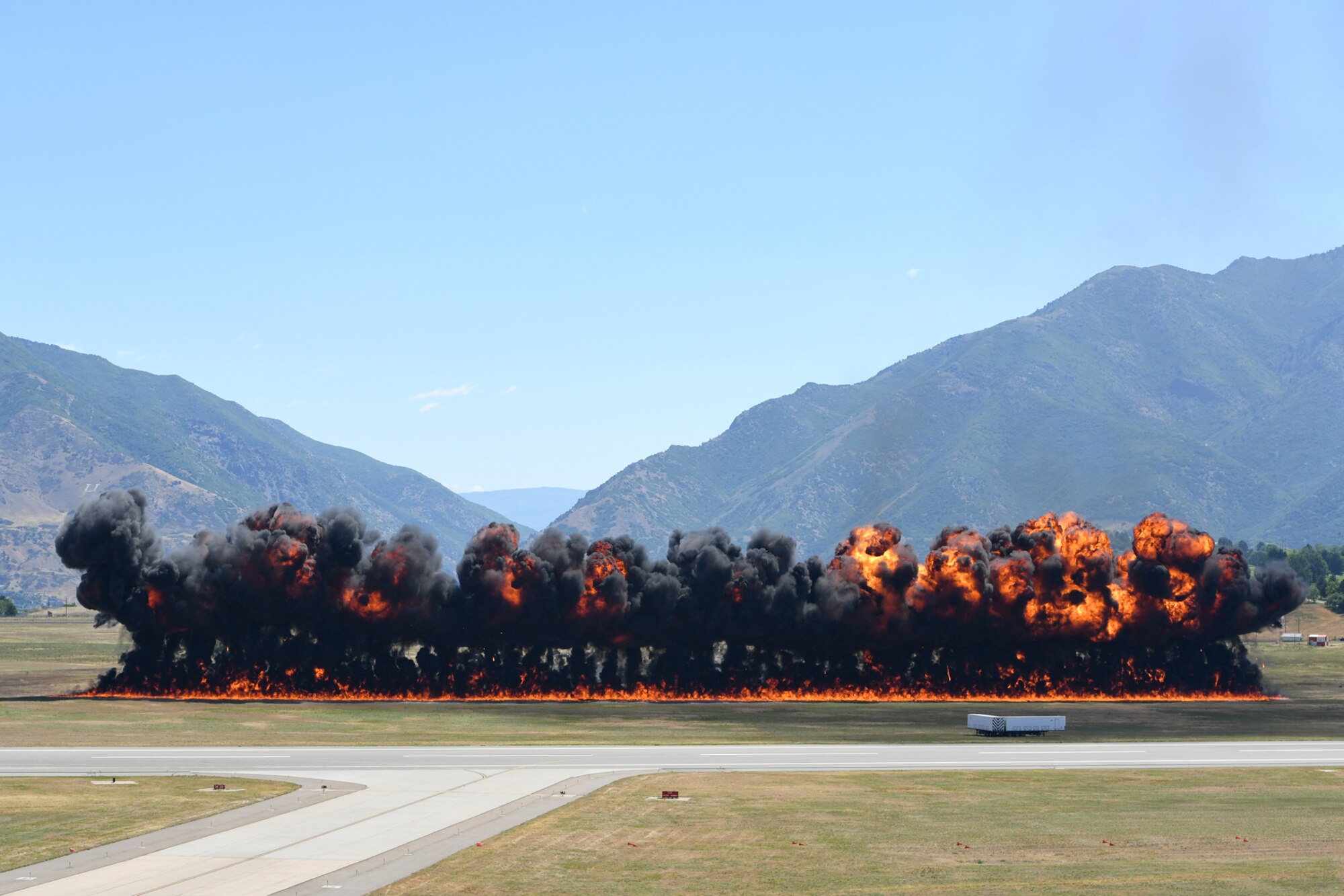A "Wall of Fire" explodes during the Warriors Over the Wasatch Air and Space Show June 23, 2018, at Hill Air Force Base, Utah. The explosion was set up and detonated by Firewalkers International Pyro and was the finale to the F-35A attack demonstration at the Hill Air Show June 23-24. (U.S. Air Force photo by Cynthia Griggs)
