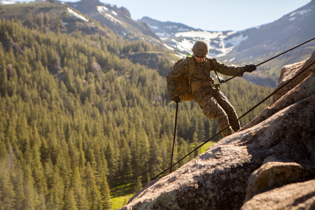 Lance Cpl. Garrett Hamilton, a rifleman with 2nd Battalion, 24th Marine Regiment, 23rd Marines, 4th Marine Division, rappels down a cliffside during Mountain Exercise 3-18, at Mountain Warfare Training Center, Bridgeport, Calif., June 22, 2018. After completing Integrated Training Exercise 4-17 last year, 2nd Bn., 24th Marines took part in MTX 3-18 to further develop small-unit leadership and build an understanding of the different climates and scenarios they could face in the future.