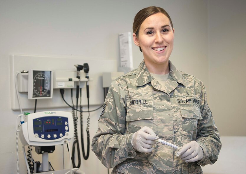 Tech. Sgt. Jennifer Sherrill, an aerospace medical technician, 86th Medical Group, Ramstein Air Base, Germany, poses for a photo in the clinic, June 19, 2018. Sherrill discusses how the guidance of more experienced medical Airmen have improved her capabilities to deliver care downrange. (U.S. Air Force photo by Senior Airman Elizabeth Baker)
