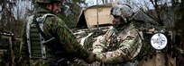Sgt Azeez Bilaali (right), a psychological operations specialist assigned to 351st Tactical Psychological Operations Company in Fort Totten, N.Y., shakes hands with Sgt. Rimas Rimkus, a soldier in the Lithuanian armed forces, after a mission brief during the Allied Spirit VII training evercise in Grafenwoehr, Germany on Nov. 17, 2017.
