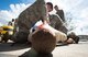 Airmen assigned to the 86th Civil Engineer Squadron Fire Emergency Services practice using a tourniquet on a medical mannequin during an 86th CES CEF emergency responder (EMR) training on Ramstein Air Base, June 25, 2018. An estimated 30 firefighters participated in the training, where 86th Medical Group professions helped them refresh skills such as transporting injured patients, splinting, and giving assisted breathing. (U.S. Air Force photo by Senior Airman Elizabeth Baker)