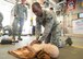 An Airman assigned to the 86th Civil Engineer Squadron Fire Emergency Services practices cardiopulmonary resuscitation on an 86th Medical Group simulator during an 86th CES CEF emergency responder training on Ramstein Air Base, June 25, 2018. The 8th MDG and CES CEF have been building a closer working relationship for the past two years, by regularly training fire fighters to maintain their emergency responder capabilities. (U.S. Air Force photo by Senior Airman Elizabeth Baker)