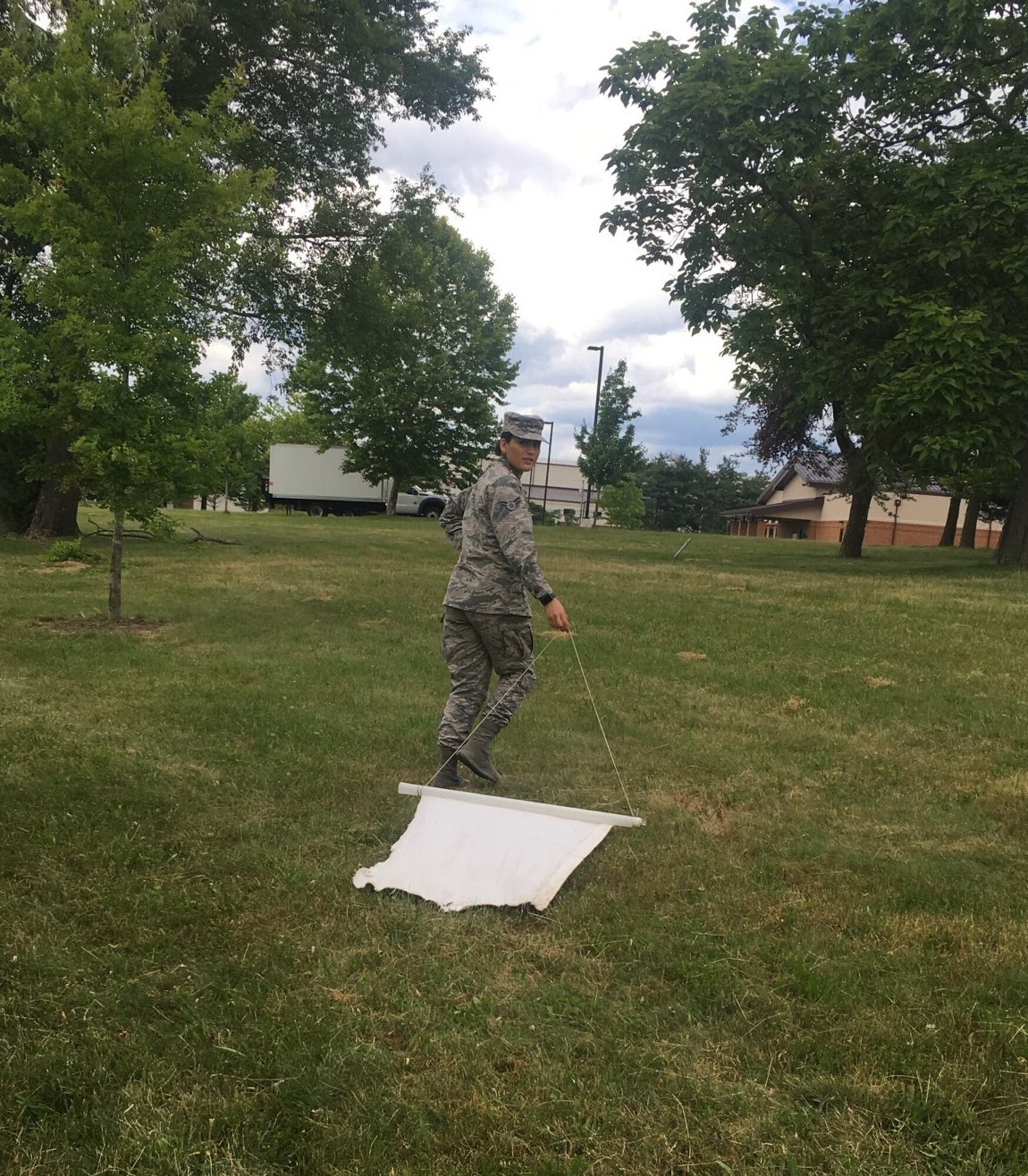 Public Health Technician A1C Yanellie Garibay from the 87 MDG conducts tick drags around JB-MDL to recommend control measures for ticks.