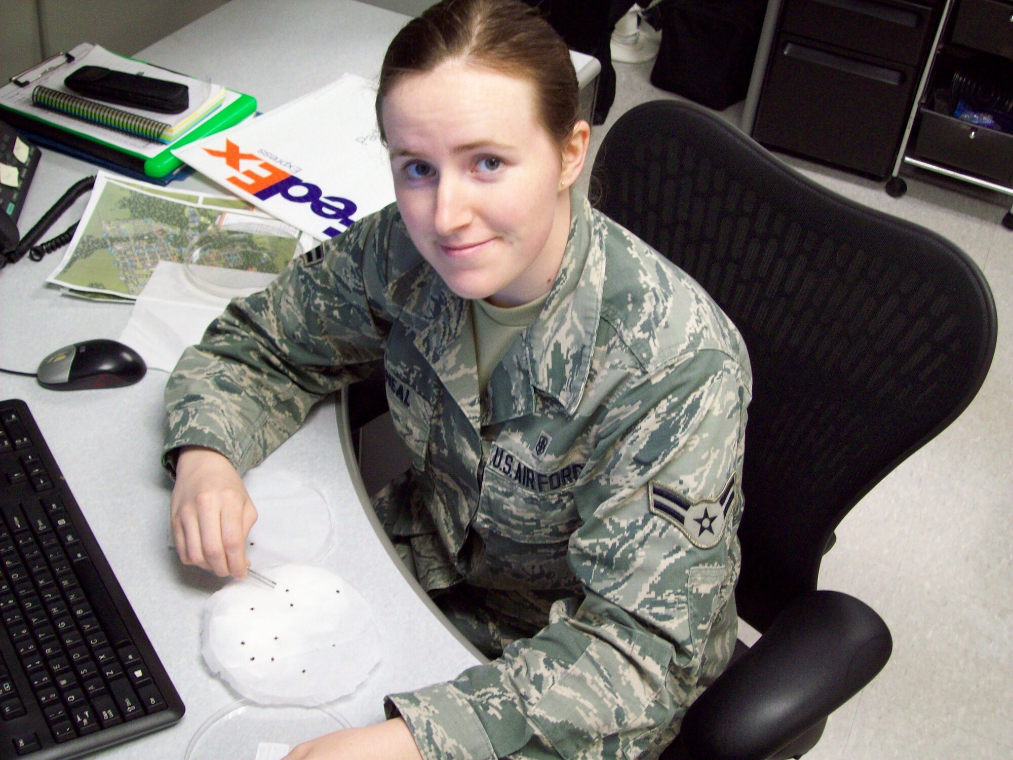 Public Health Technician SrA Aleasha McNeal from the 87 MDG sorting mosquitos for submission to USAFSAM as part of the integrated Pest Management Program.