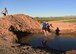 Airmen participate in the 56th Force Support Squadron’s 2018 Jump in the Mud 5K June 22, 2018 at Luke Air Force Base, Ariz.