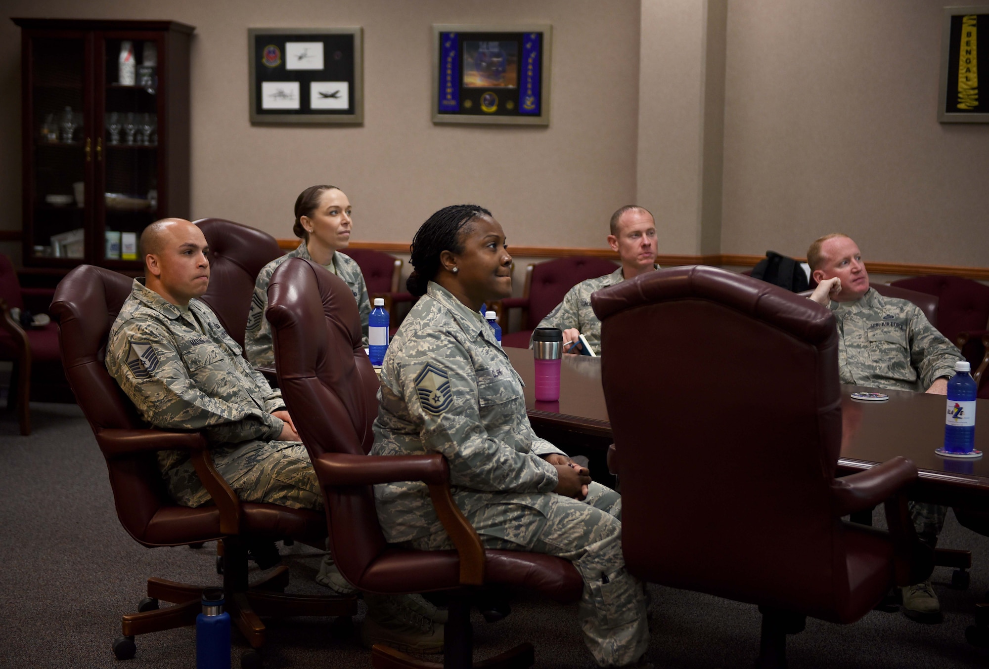 Senior enlisted leaders of the 14th Flying Training Wing and Chief Master Sgt. Juliet Gudgel, command chief of Air Education and Training Command, listen to the history of the pilot training base at Columbus Air Force Base, Mississippi, June 21, 2018. During Gudgel’s visit to Columbus AFB, she toured the Air Traffic Control tower and met with one of the 2018 Outstanding Airman of the Year award recipients. (U.S Air Force photo by Airman 1st Class Keith Holcomb)