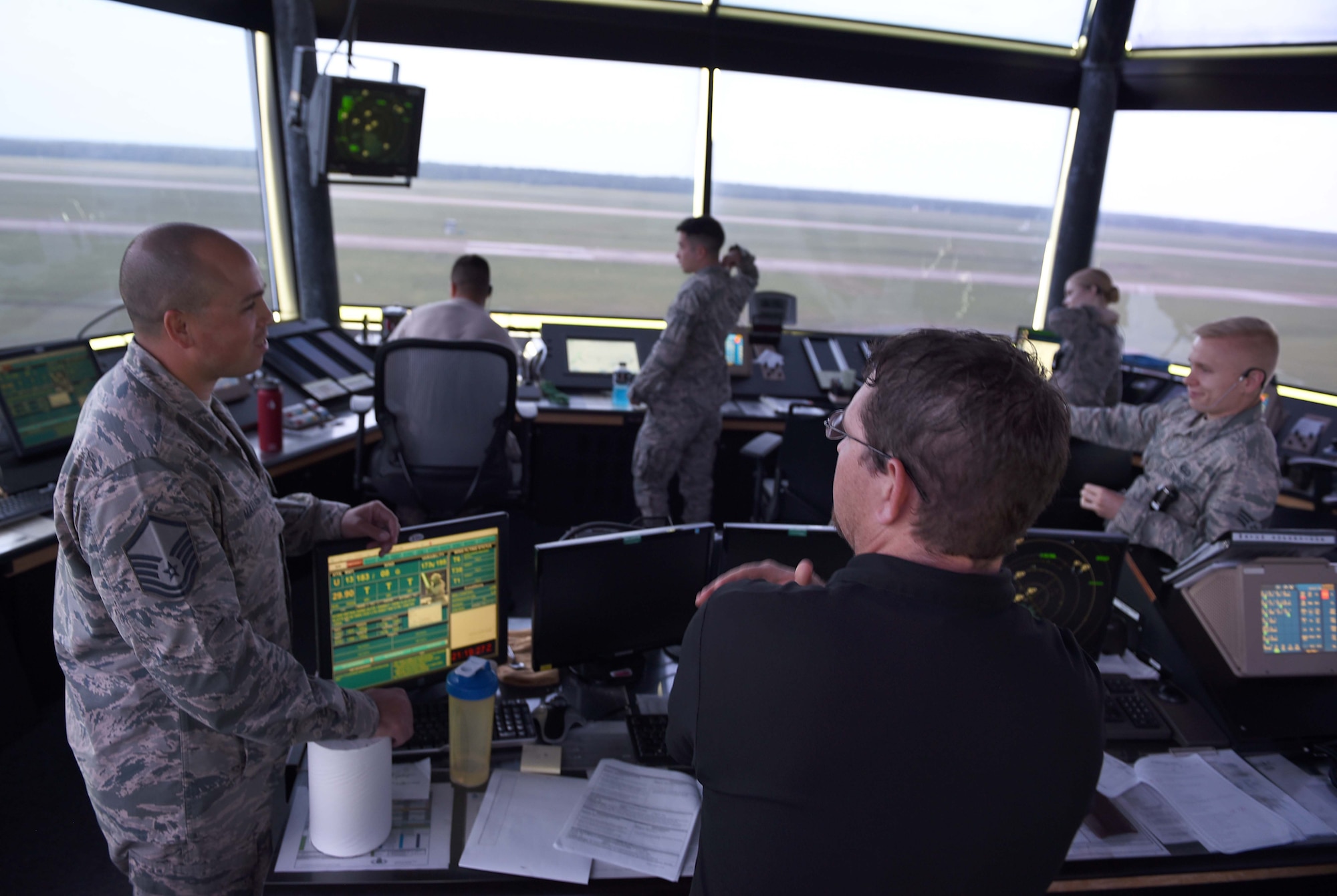 U.S. Air Force Master Sgt. Joshua Matias, 14th Operations Group air traffic control tower chief controller speaks with an afternoon crew June 20, 2018, on Columbus Air Force Base, Mississippi. Matias tries to visit each crew throughout the day so every Airman gets a chance to interact with him. (U.S. Air Force photo by Airman 1st Class Keith Holcomb)
