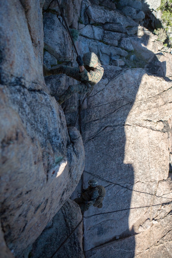 Marines with 2nd Battalion, 24th Marine Regiment, 23rd Marines, 4th Marine Division, rappel down a cliffside, during Mountain Exercise 3-18, at Mountain Warfare Training Center, Bridgeport, Calif., June 22, 2018. After completing Integrated Training Exercise 4-17 last year, 2nd Bn., 24th Marines took part in MTX 3-18 to further develop small-unit leadership and build an understanding of the different climates and scenarios they could face in the future. (U.S. Marine Corps photo by Cpl. Dallas Johnson)