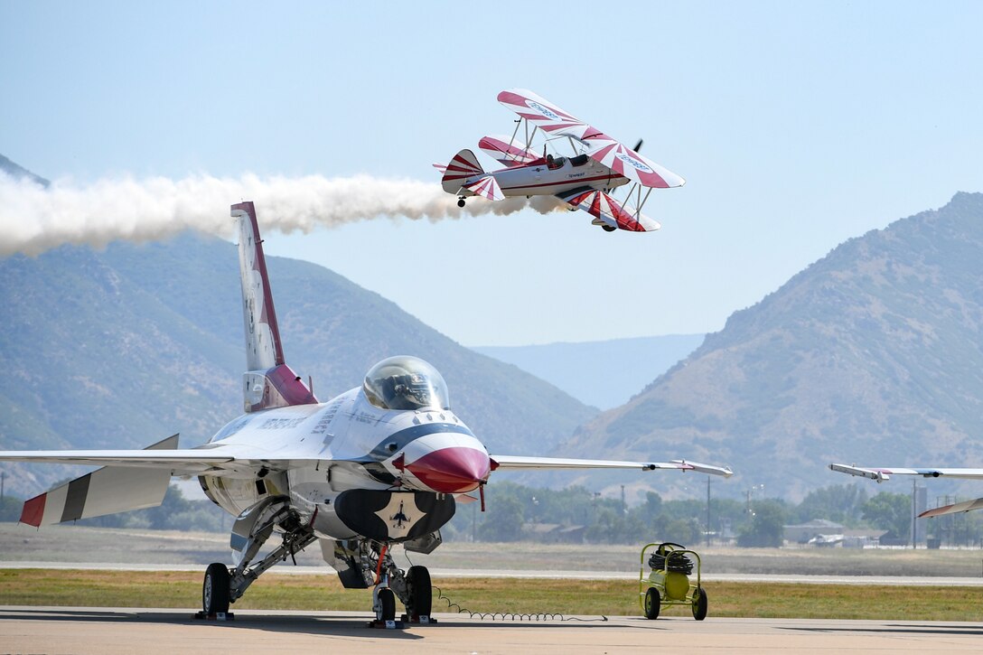 Gary Rower flies his vintage Stearman overhead during the Warriors Over the Wasatch Air and Space Show June 23, 2018, at Hill Air Force Base, Utah. Rower was one several military and civilian performers at the show. (U.S. Air Force photo by Cynthia Griggs)