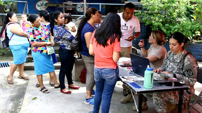 Salvadoran citizens check-in for medical treatment by U.S. military doctors.