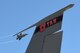 An F-35A Lightning II from the 388th Fighter Wing flies over the top of the vertical stabilizer on a Utah Air National Guard KC-135 static display during the Warriors Over the Wasatch Air and Space Show June 24, 2018, at Hill Air Force Base, Utah. The F-35 was part of a four-ship participating in an attack demonstration. (U.S. Air Force photo by Todd Cromar)