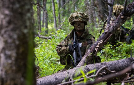 U.S. Army Alaska infantrymen from the 1st Stryker Brigade Combat Team, 25th Infantry Division, and Japan Ground Self-Defense Force soldiers from the 1st Airborne Brigade
execute platoon movement-to-contact and support-by-fire operations during Exercise Arctic Aurora at Joint Base Elmendorf-Richardson, Alaska, June 14, 2018. Arctic Aurora is an annual bilateral training exercise involving elements of U.S. Army Alaska and the JGSDF which focuses on strengthening ties between the two nations by executing combined small-unit airborne proficiency operations and basic small-arms marksmanship.