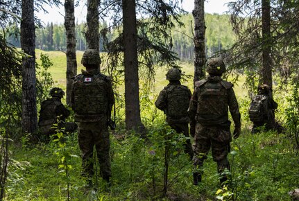 U.S. Army Alaska infantrymen from the 1st Stryker Brigade Combat Team, 25th Infantry Division, and Japan Ground Self-Defense Force soldiers from the 1st Airborne Brigade
execute platoon movement-to-contact and support-by-fire operations during Exercise Arctic Aurora at Joint Base Elmendorf-Richardson, Alaska, June 14, 2018. Arctic Aurora is an annual bilateral training exercise involving elements of U.S. Army Alaska and the JGSDF which focuses on strengthening ties between the two nations by executing combined small-unit airborne proficiency operations and basic small-arms marksmanship.