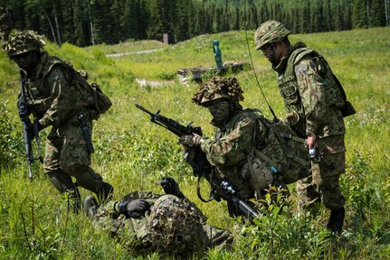 U.S. Army Alaska infantrymen from the 1st Stryker Brigade Combat Team, 25th Infantry Division, and Japan Ground Self-Defense Force soldiers from the 1st Airborne Brigade
execute platoon movement-to-contact and support-by-fire operations during Exercise Arctic Aurora at Joint Base Elmendorf-Richardson, Alaska, June 14, 2018. Arctic Aurora is an annual bilateral training exercise involving elements of U.S. Army Alaska and the JGSDF which focuses on strengthening ties between the two nations by executing combined small-unit airborne proficiency operations and basic small-arms marksmanship.