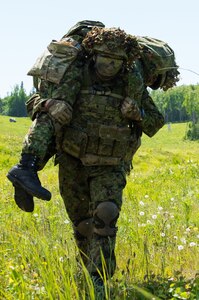 U.S. Army Alaska infantrymen from the 1st Stryker Brigade Combat Team, 25th Infantry Division, and Japan Ground Self-Defense Force soldiers from the 1st Airborne Brigade
execute platoon movement-to-contact and support-by-fire operations during Exercise Arctic Aurora at Joint Base Elmendorf-Richardson, Alaska, June 14, 2018. Arctic Aurora is an annual bilateral training exercise involving elements of U.S. Army Alaska and the JGSDF which focuses on strengthening ties between the two nations by executing combined small-unit airborne proficiency operations and basic small-arms marksmanship.