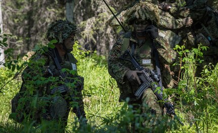 U.S. Army Alaska infantrymen from the 1st Stryker Brigade Combat Team, 25th Infantry Division, and Japan Ground Self-Defense Force soldiers from the 1st Airborne Brigade
execute platoon movement-to-contact and support-by-fire operations during Exercise Arctic Aurora at Joint Base Elmendorf-Richardson, Alaska, June 14, 2018. Arctic Aurora is an annual bilateral training exercise involving elements of U.S. Army Alaska and the JGSDF which focuses on strengthening ties between the two nations by executing combined small-unit airborne proficiency operations and basic small-arms marksmanship.