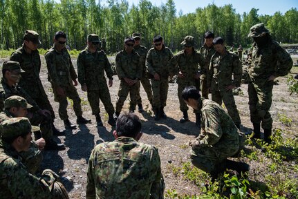 U.S. Army Alaska infantrymen from the 1st Stryker Brigade Combat Team, 25th Infantry Division, and Japan Ground Self-Defense Force soldiers from the 1st Airborne Brigade
execute platoon movement-to-contact and support-by-fire operations during Exercise Arctic Aurora at Joint Base Elmendorf-Richardson, Alaska, June 14, 2018. Arctic Aurora is an annual bilateral training exercise involving elements of U.S. Army Alaska and the JGSDF which focuses on strengthening ties between the two nations by executing combined small-unit airborne proficiency operations and basic small-arms marksmanship.