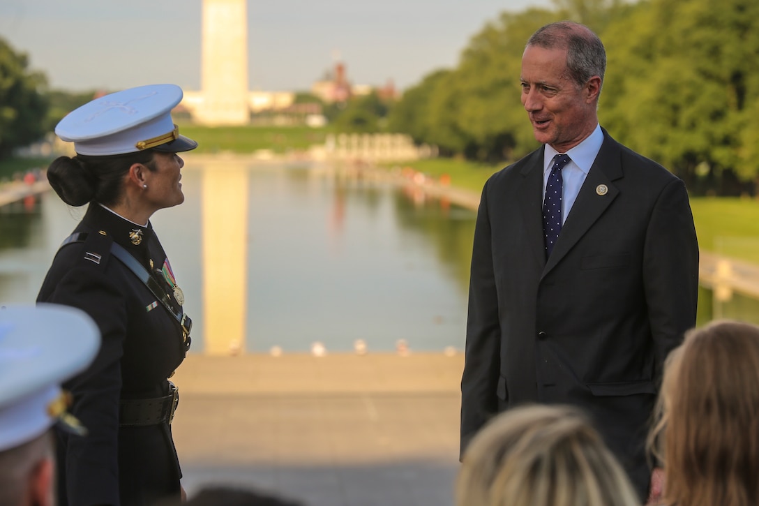 The honorable William McClellan Thornberry, Texas' 13th Congressional District Congressman, is greeted by Capt. Evita Mosqueda, protocal officer, Marine Barracks Washington D.C. at the opening of a Tuesday Sunset Parade at the Lincoln Memorial, Washington D.C., June 26, 2018. The guest of honor for the parade was the Honorable William McClellan Thornberry, Texas’ 13th Congressional District Congressman, and the hosting official was Lt. Gen. Steven R. Rudder, deputy commandant, aviation, headquarters Marine Corps. (Official U.S. Marine Corps photo by Cpl. Damon Mclean/Released)