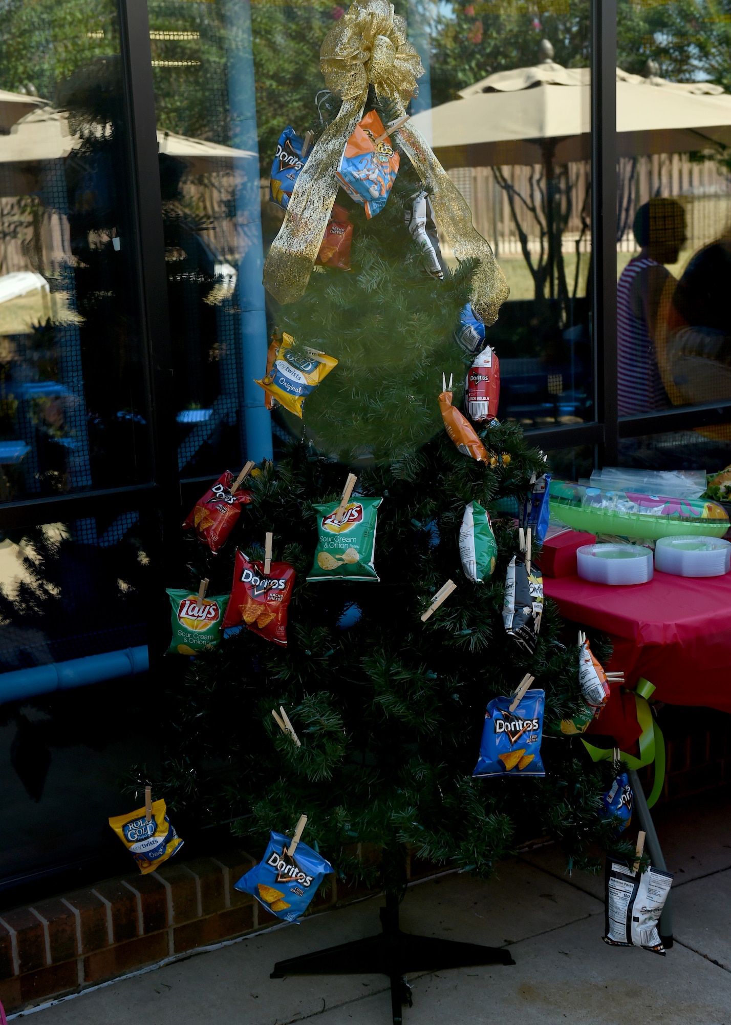 A summer themed Christmas tree stands as decoration for the Hearts Apart Christmas event, June 22, 2018, at Altus Air Force Base, Okla.