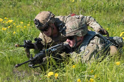 U.S. Army Alaska infantrymen from the 1st Stryker Brigade Combat Team, 25th Infantry Division, and Japan Ground Self-Defense Force soldiers from the 1st Airborne Brigade
execute platoon movement-to-contact and support-by-fire operations during Exercise Arctic Aurora at Joint Base Elmendorf-Richardson, Alaska, June 14, 2018. Arctic Aurora is an annual bilateral training exercise involving elements of U.S. Army Alaska and the JGSDF which focuses on strengthening ties between the two nations by executing combined small-unit airborne proficiency operations and basic small-arms marksmanship.