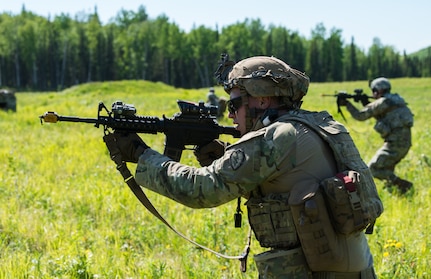 U.S. Army Alaska infantrymen from the 1st Stryker Brigade Combat Team, 25th Infantry Division, and Japan Ground Self-Defense Force soldiers from the 1st Airborne Brigade
execute platoon movement-to-contact and support-by-fire operations during Exercise Arctic Aurora at Joint Base Elmendorf-Richardson, Alaska, June 14, 2018. Arctic Aurora is an annual bilateral training exercise involving elements of U.S. Army Alaska and the JGSDF which focuses on strengthening ties between the two nations by executing combined small-unit airborne proficiency operations and basic small-arms marksmanship.