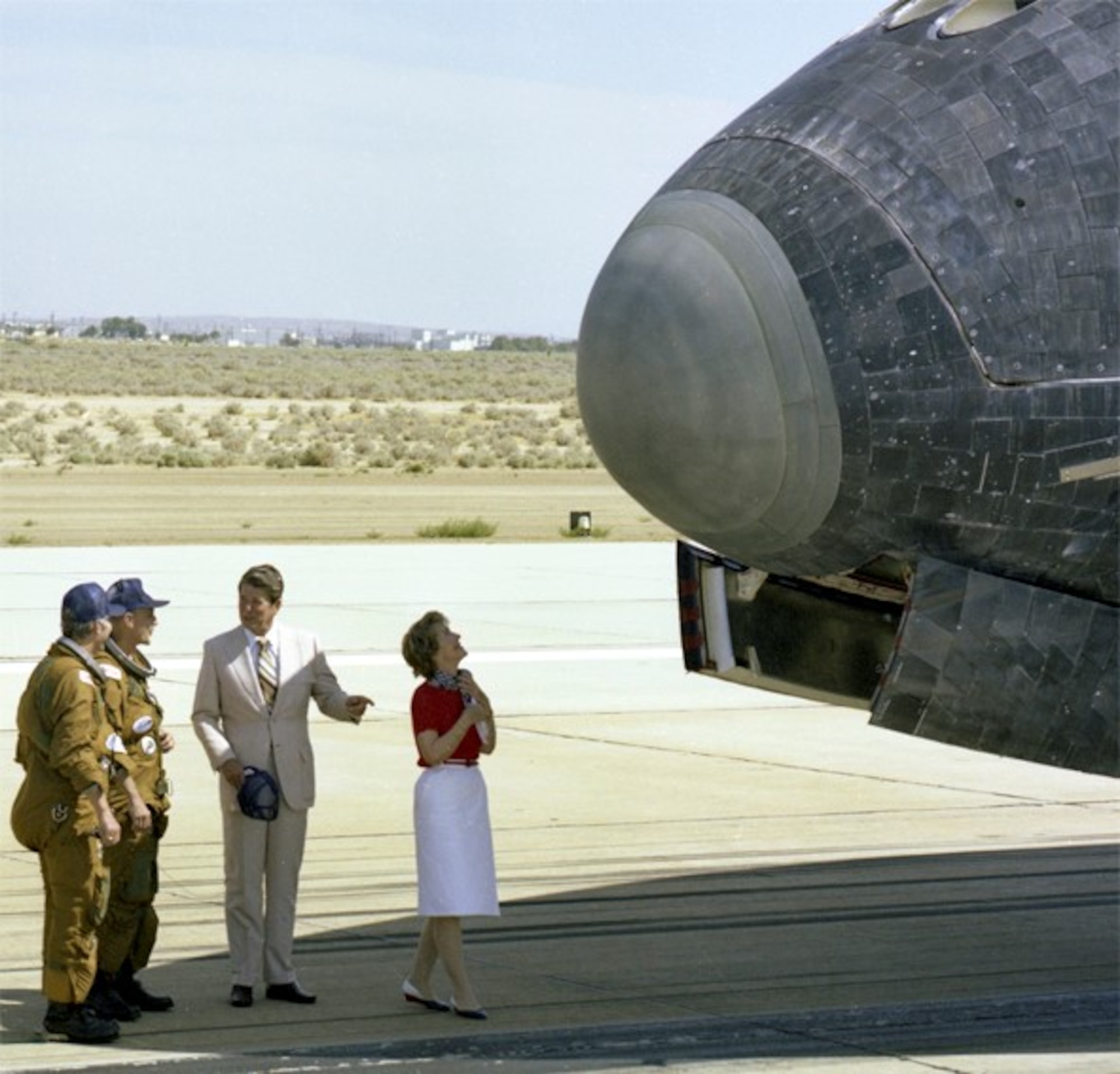 Shuttle Columbia landed in view of President Ronald Reagan, First Lady Nancy Reagan, and some 500,000 visitors and guests. The Shuttle’s fourth orbital flight was its first landing on a concrete runway and marked the end of its formal flight test program. 
Later that very same day, the nation’s second Space Shuttle, Challenger, departed Edwards for Florida atop its 747 carrier aircraft while President Reagan was addressing the crowd.
Challenger was the first of the orbiters to be configured for operational missions in its original design.