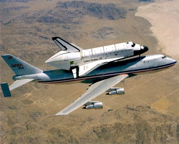 Shuttle Columbia landed in view of President Ronald Reagan, First Lady Nancy Reagan, and some 500,000 visitors and guests. The Shuttle’s fourth orbital flight was its first landing on a concrete runway and marked the end of its formal flight test program. 
Later that very same day, the nation’s second Space Shuttle, Challenger, departed Edwards for Florida atop its 747 carrier aircraft while President Reagan was addressing the crowd.
Challenger was the first of the orbiters to be configured for operational missions in its original design.