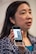 Dr. Jing Li, NASA Ames Research Center, Moffett Field, Calif., shows off her E-NOSE breathalyzer during a meeting with members of the 60th Medical Group at Travis Air Force Base, Calif., June 1, 2018. NASA and David Grant USAF Medical Center are meeting for a potential collaboration between the two organizations to help in future space exploration. (U.S. Air Force photo by Louis Briscese)
