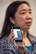Dr. Jing Li, NASA Ames Research Center, Moffett Field, Calif., shows off her E-NOSE breathalyzer during a meeting with members of the 60th Medical Group at Travis Air Force Base, Calif., June 1, 2018. NASA and David Grant USAF Medical Center are meeting for a potential collaboration between the two organizations to help in future space exploration. (U.S. Air Force photo by Louis Briscese)