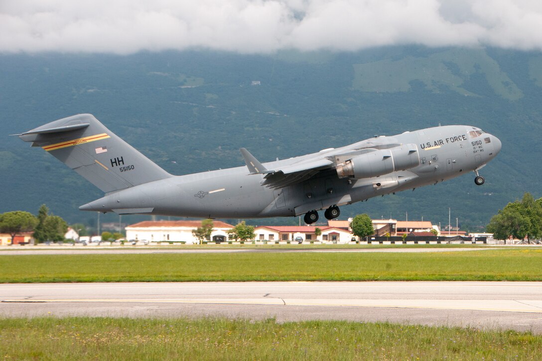 A fully-loaded C-17 Globemaster III from the Hawaii Air National Guard’s 204th Airlift Squadron takes off the flight line during exercise Bayonet Strike June 13, 2018, at Aviano Air Base, Italy