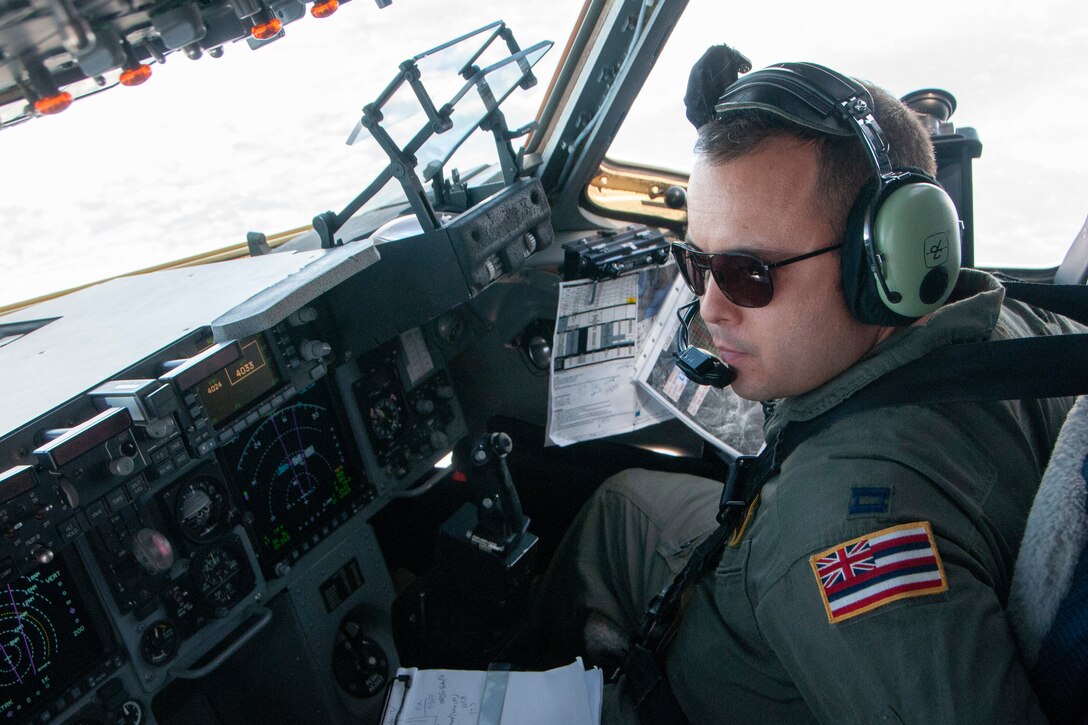 Capt. Joe Kina, 204th Airlift Squadron pilot, flies a C-17 Globemaster III during exercise Bayonet Strike June 12, 2018, near Casa De Campo, Zaragoza, Spain.