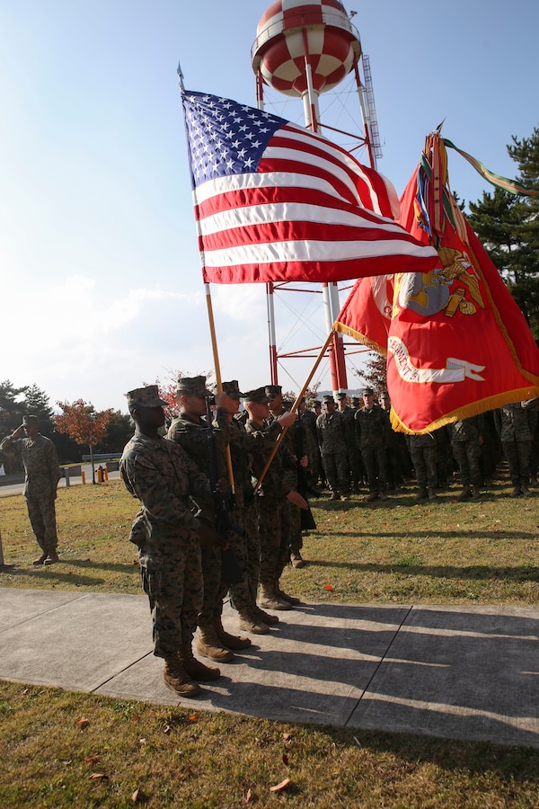 U.S. Marines with Combat Logistics Regiment 3, 3d Marine Logistics Group, post the colors during their cake cutting ceremony Nov. 10, 2017 for the 242nd Marine Corps birthday at Camp Mujuk, Pohang, South Korea. CLR-3 conducted the ceremony during Winter Workhorse 17/Korean Marine Exchange Program 18.1. KMEP 18.1 familiarizes the American armed forces with the Korean Peninsula and builds upon an enduring alliance between the two militaries. (U.S. Marine Corps photo by Sgt. Tiffany Edwards)