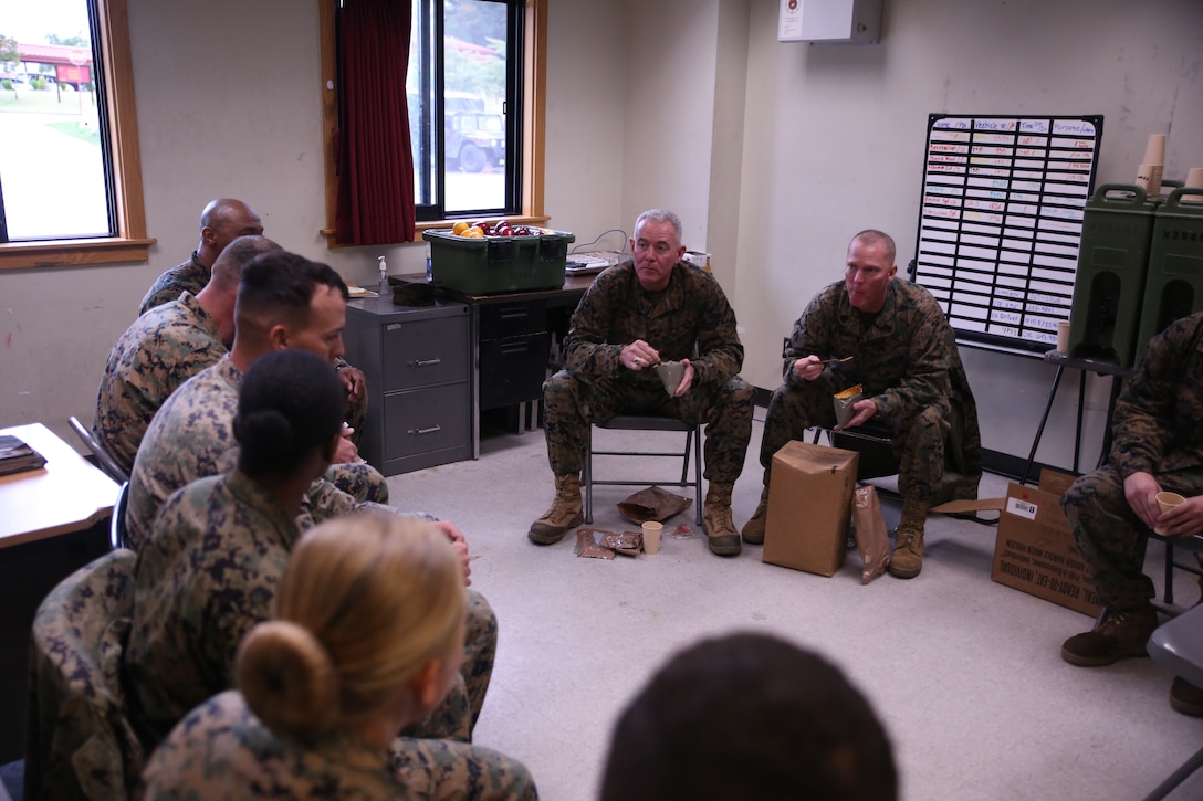 U.S. Marine Corps Brig. Gen Daniel B. Conley, commanding general of 3d Marine Logistics Group, III Marine Expeditionary Force, and Sgt. Maj. James N. Calbough, sergeant major of 3d MLG, III MEF, eat lunch with Marines from Motor Transport Company, 3rd Transportation Support Battalion, Combat Logistics Regiment 3 Oct. 19, 2017 at Camp Mujuk, Pohang, Republic of Korea. U.S. Marines with 3d MLG and ROK Marines with Amphibious Support Group participated in bilateral logistics training during Exercise Winter Workhorse 17/Korean Marine Exchange Program 18.1. The exercise highlights the two countries’ combined commitment to the defense of the ROK and shared commitment to peace and security in the region. (U.S Marine Corps photo by Sgt. Tiffany Edwards)