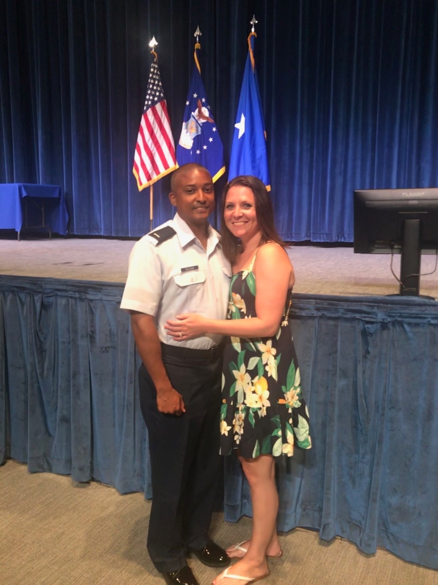 1st Lieutenant Kenneth Ellison poses for a picture with his wife, Melissa Ellison, before the Commissioned Officer Training Class 18-04 Graduation. Ellison commissioned after 14 years of enlisted service and continues his family’s legacy of continuous Air Force service since his grandfather enlisted in 1947.